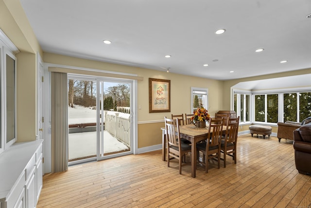 dining area featuring a healthy amount of sunlight and light wood-type flooring