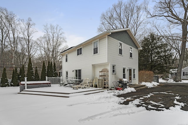 view of snow covered house