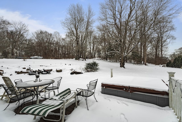 view of yard layered in snow