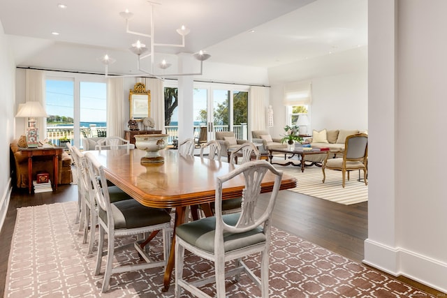 1060 Harbor Rd, Fairfield, CT 06890 - dining area featuring plenty of natural light, dark wood-type flooring, and recessed lighting