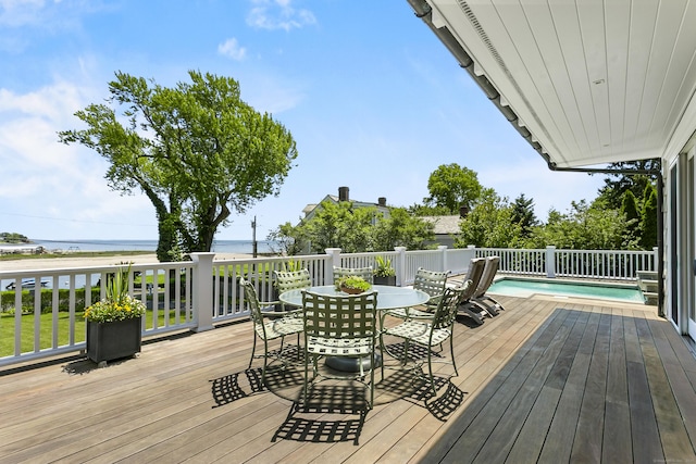 1060 Harbor Rd, Fairfield, CT 06890 - wooden deck featuring outdoor dining space and a water view