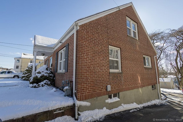 view of snow covered property