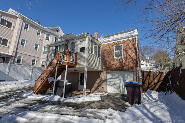 view of snow covered property