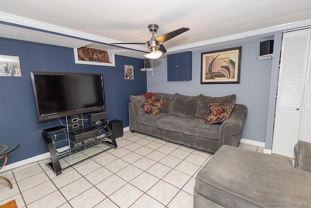 tiled living room featuring ceiling fan