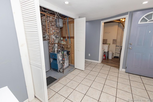 tiled foyer with gas water heater