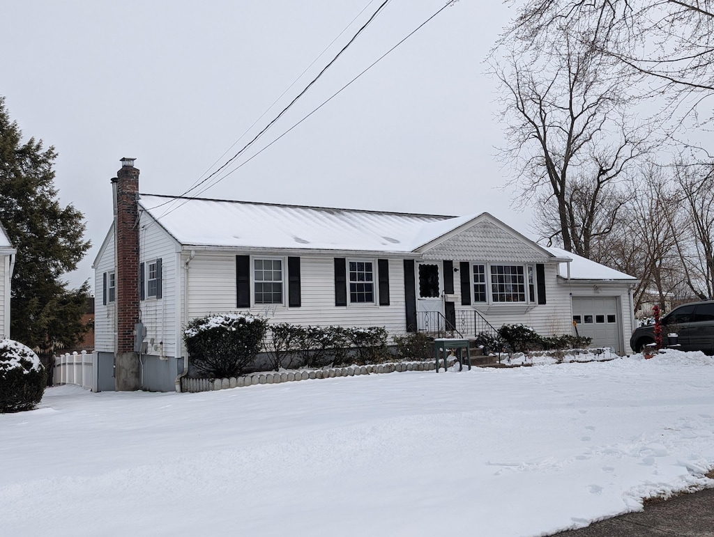 view of front of home featuring a garage