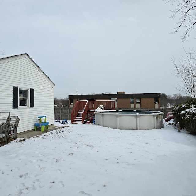 exterior space featuring a pool side deck