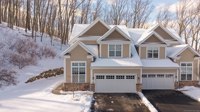 craftsman house with a garage