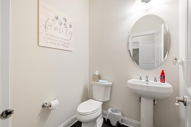 bathroom featuring toilet