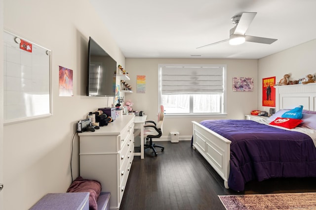 bedroom featuring dark hardwood / wood-style floors and ceiling fan