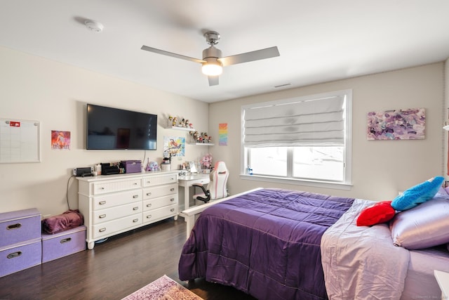 bedroom featuring dark wood-type flooring and ceiling fan