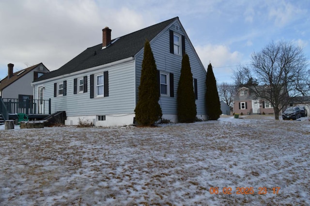 view of snow covered property