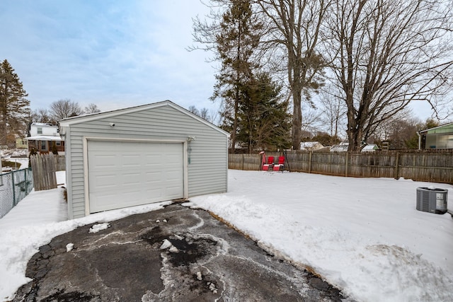 view of snow covered garage