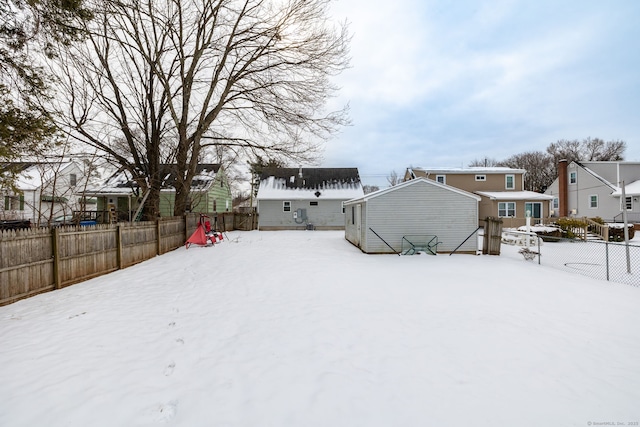 view of yard covered in snow