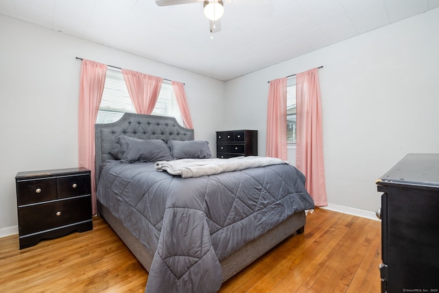 bedroom featuring ceiling fan and light hardwood / wood-style floors