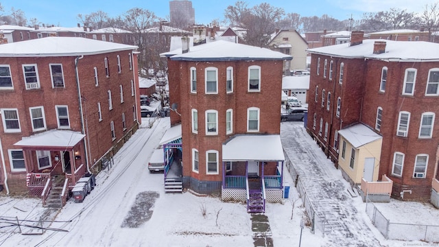 view of snow covered building