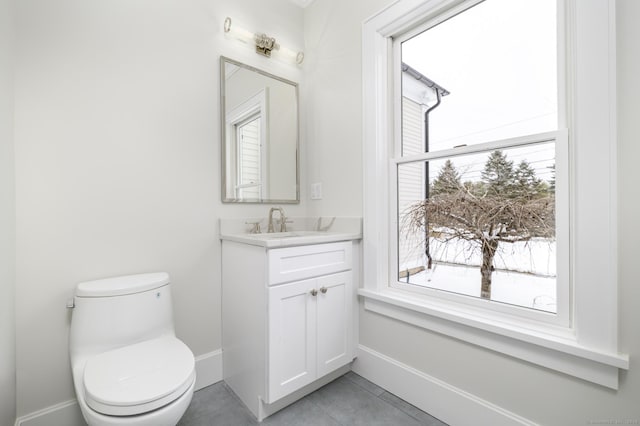 40 Hoyclo Rd, Stamford, CT 06903 - bathroom featuring a healthy amount of sunlight, tile patterned floors, baseboards, and toilet