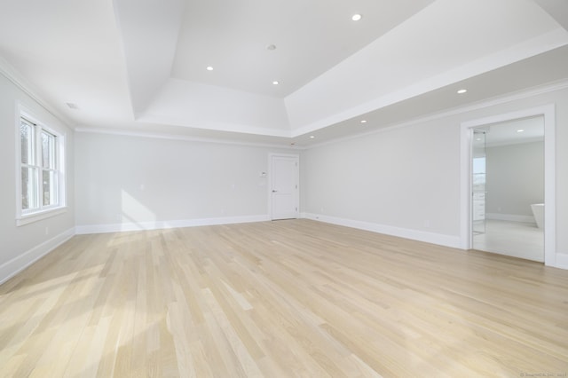 40 Hoyclo Rd, Stamford, CT 06903 - unfurnished room with light wood-type flooring, baseboards, a tray ceiling, and crown molding
