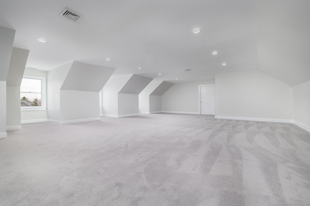 40 Hoyclo Rd, Stamford, CT 06903 - additional living space with lofted ceiling, visible vents, recessed lighting, and light colored carpet