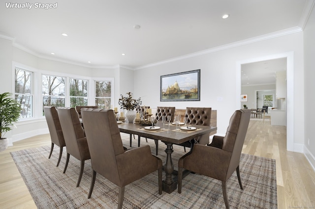 40 Hoyclo Rd, Stamford, CT 06903 - dining area featuring recessed lighting, light wood-style flooring, crown molding, and baseboards