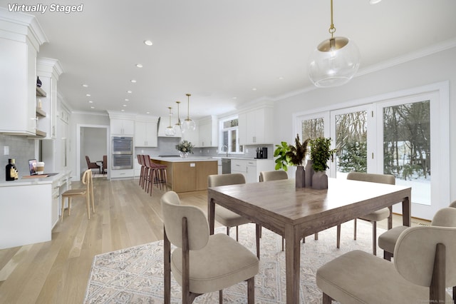 40 Hoyclo Rd, Stamford, CT 06903 - dining area with recessed lighting, light wood-style floors, and ornamental molding