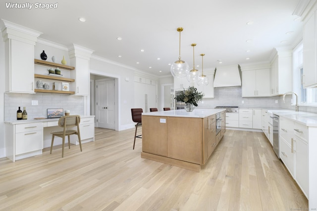 40 Hoyclo Rd, Stamford, CT 06903 - kitchen with premium range hood, tasteful backsplash, appliances with stainless steel finishes, and open shelves