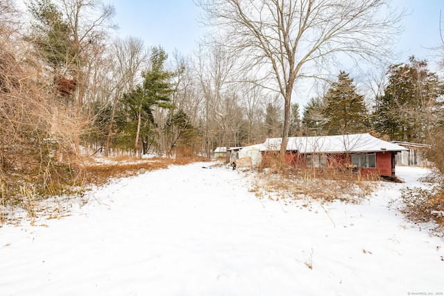 view of snowy yard