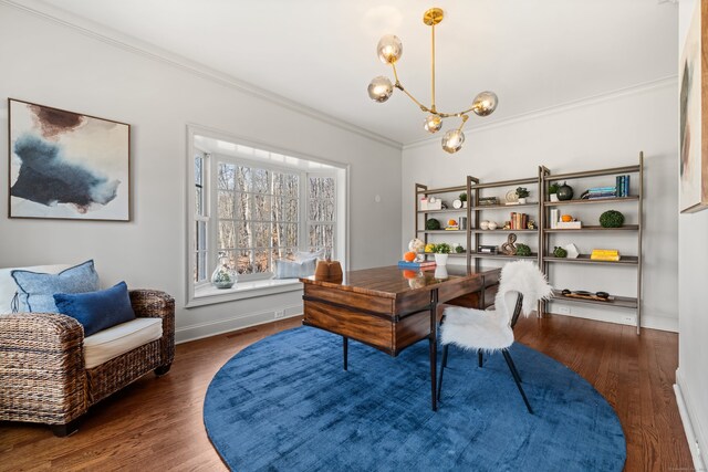 office with a chandelier, baseboards, wood finished floors, and crown molding