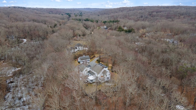 aerial view with a wooded view