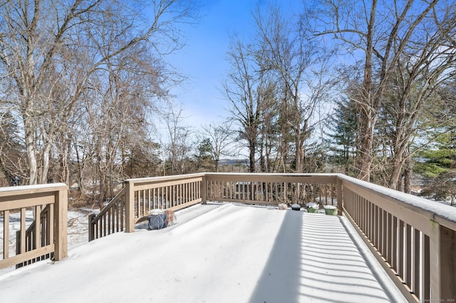 view of snow covered deck