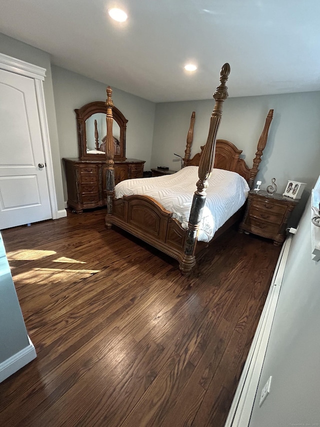 bedroom featuring recessed lighting, baseboards, and wood finished floors