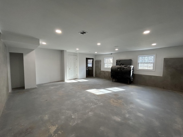 basement with recessed lighting and visible vents