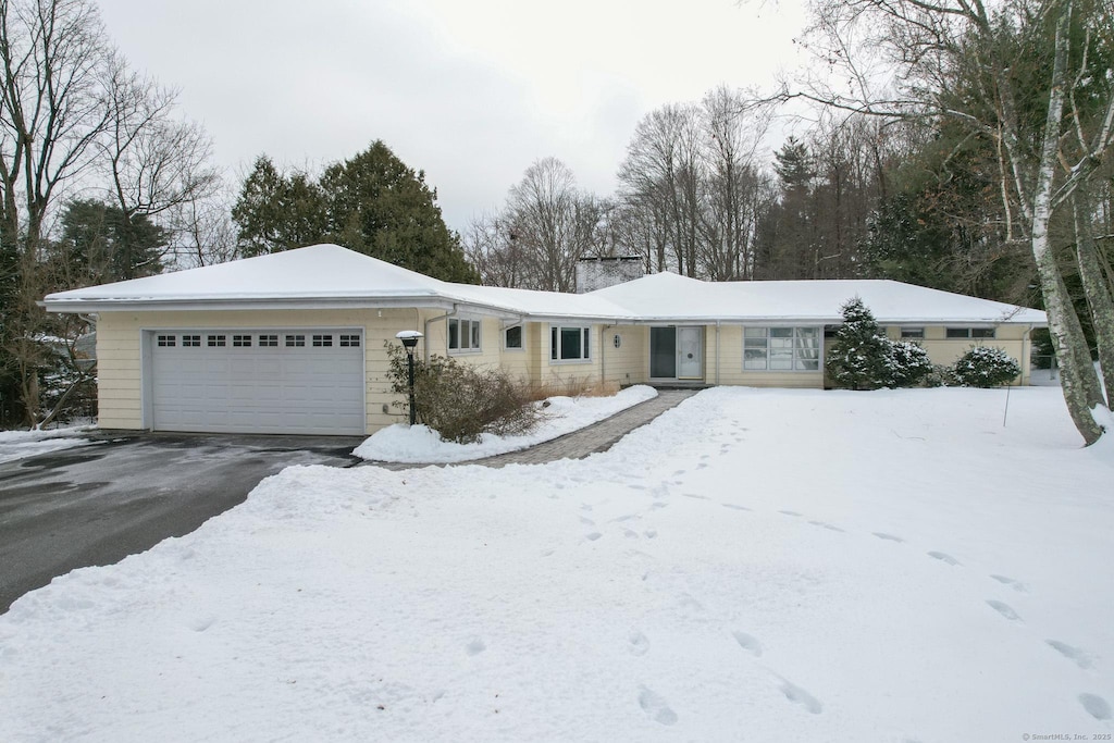 single story home with a garage