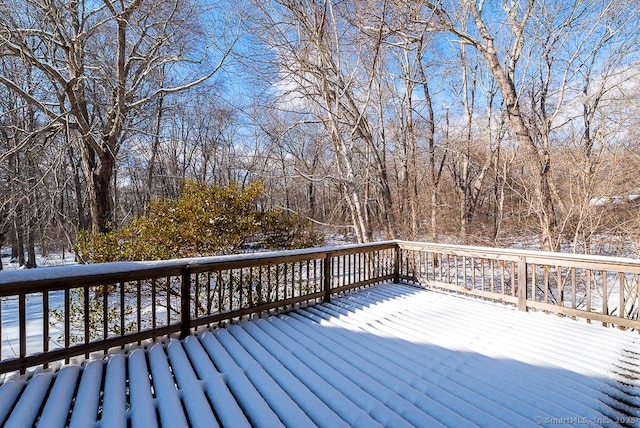 view of snow covered deck