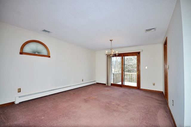 spare room with a baseboard radiator, carpet floors, and a notable chandelier