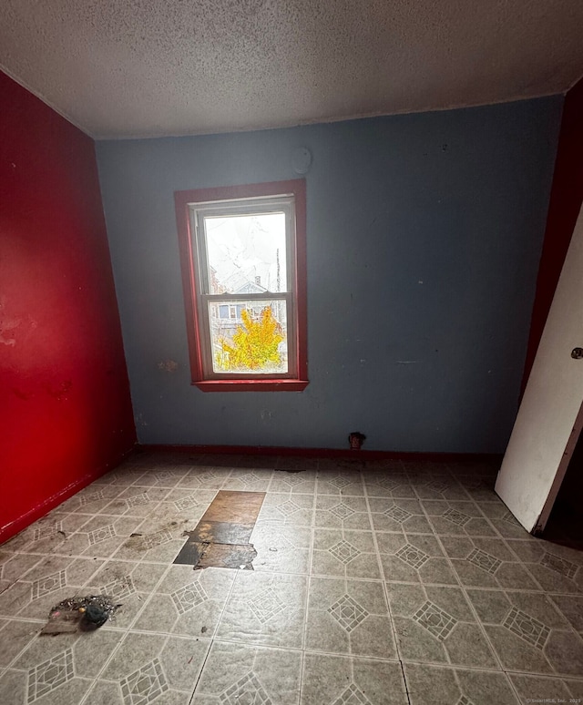43 Elliott St, New Haven, CT 06519 - empty room featuring a textured ceiling