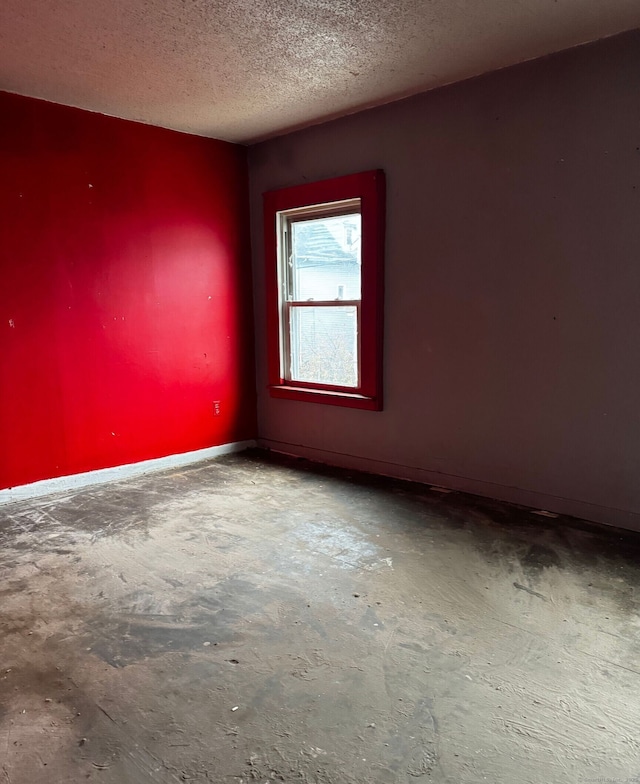 43 Elliott St, New Haven, CT 06519 - empty room featuring concrete flooring and a textured ceiling