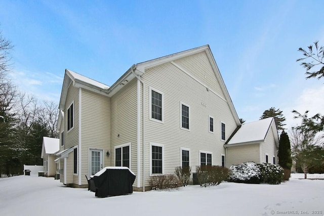 view of snow covered property