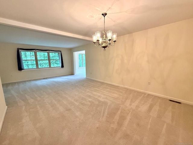 4 Amberly Ln Unit 4, East Lyme, CT 06357 - carpeted spare room featuring a chandelier and baseboards
