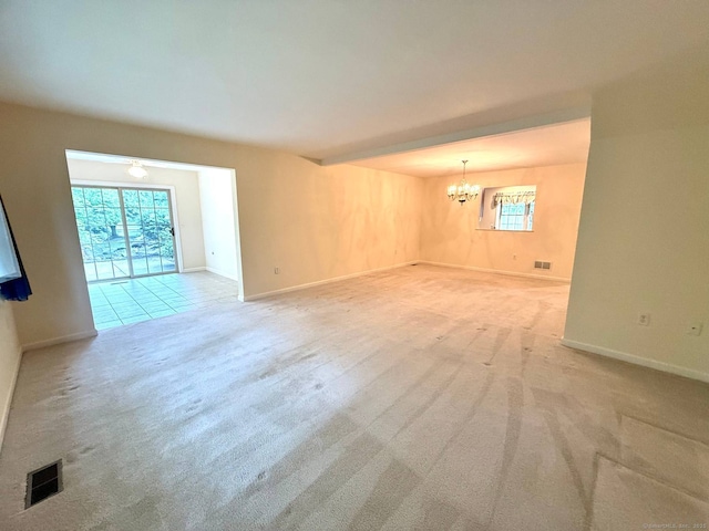 4 Amberly Ln Unit 4, East Lyme, CT 06357 - empty room with carpet floors, a chandelier, and baseboards