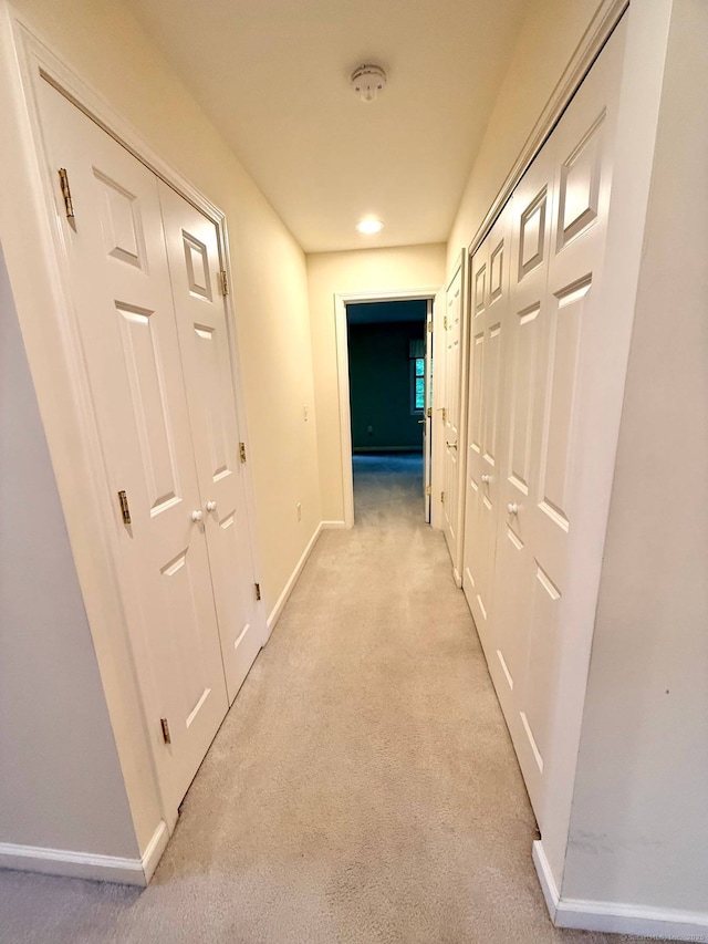 4 Amberly Ln Unit 4, East Lyme, CT 06357 - hallway featuring baseboards and light carpet