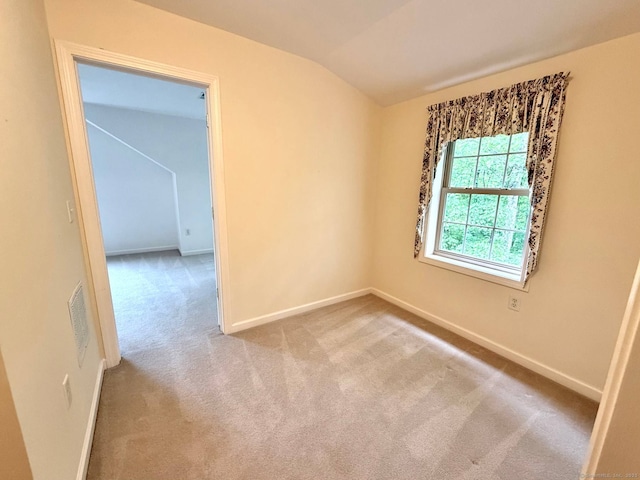 4 Amberly Ln Unit 4, East Lyme, CT 06357 - carpeted spare room featuring lofted ceiling and baseboards
