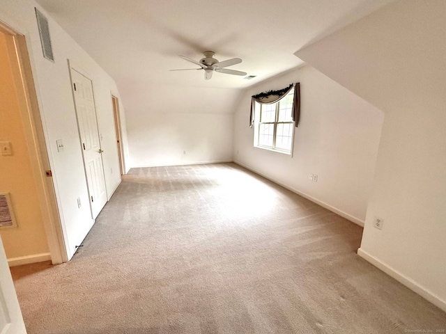 4 Amberly Ln Unit 4, East Lyme, CT 06357 - unfurnished bedroom featuring carpet flooring, lofted ceiling, baseboards, and ceiling fan