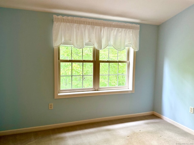 4 Amberly Ln Unit 4, East Lyme, CT 06357 - carpeted empty room featuring baseboards