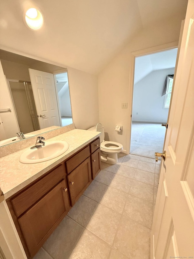 4 Amberly Ln Unit 4, East Lyme, CT 06357 - bathroom featuring vaulted ceiling, vanity, toilet, tile patterned floors, and an enclosed shower