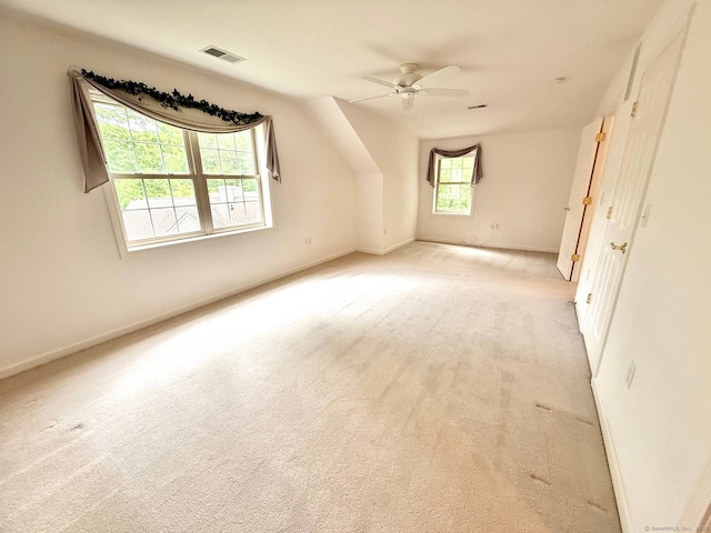 4 Amberly Ln Unit 4, East Lyme, CT 06357 - spare room featuring light colored carpet, a ceiling fan, and baseboards