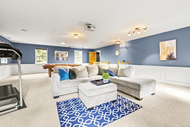 living room with light colored carpet and pool table