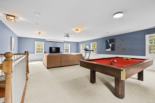 recreation room with light colored carpet, plenty of natural light, and pool table