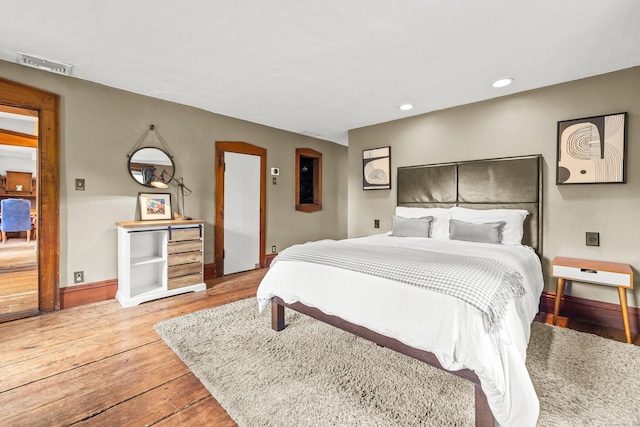 bedroom featuring hardwood / wood-style flooring