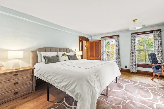 bedroom with light hardwood / wood-style floors